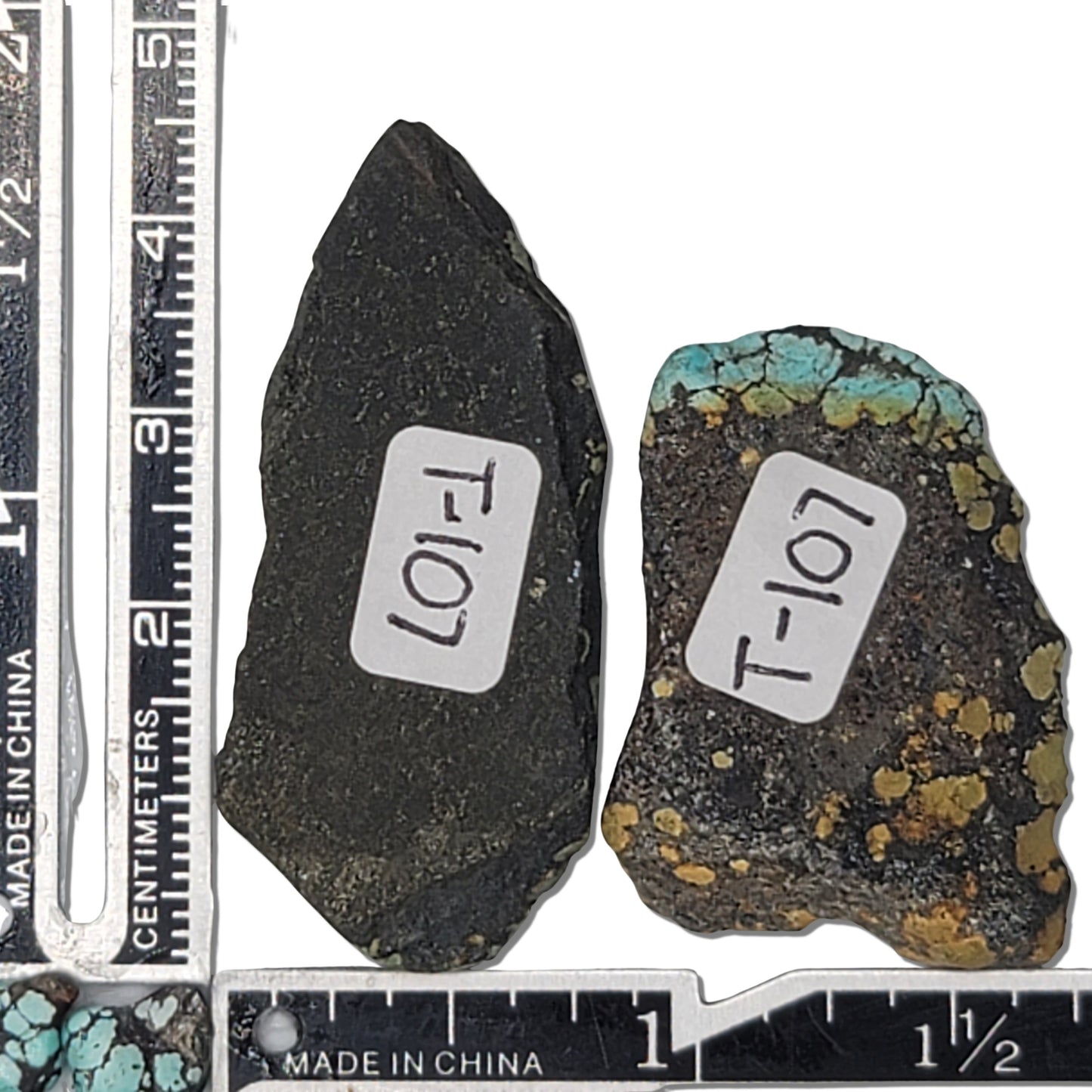 An 18-gram pair of natural turquoise stones featuring deep green and golden hues with hints of blue. Ideal for custom jewelry or lapidary use, available at www.naturalturquoise.com.