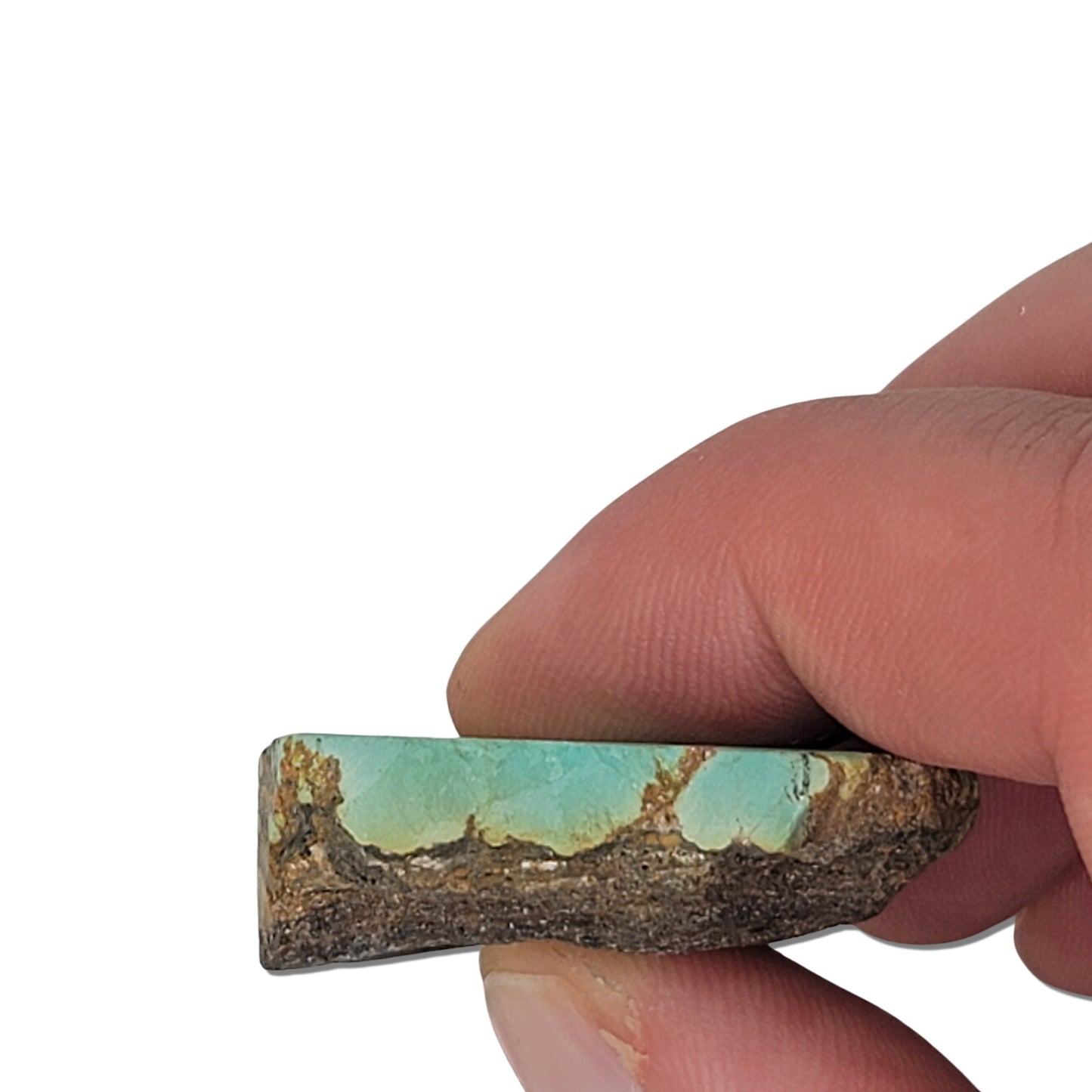 A 19-gram turquoise stone in a soothing greenish-blue shade with a fine brown matrix, ideal for crafting or collecting. Available at www.naturalturquoise.com.